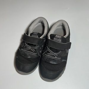 Little boys black Nike sneakers. Size 10
